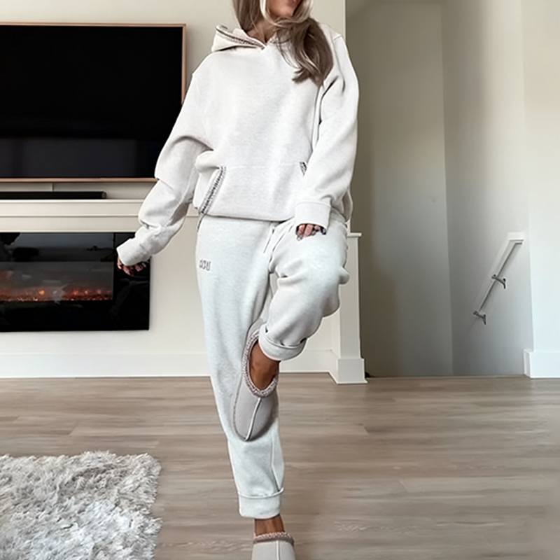 Women's casual outfit with hooded top and elastic waist pants