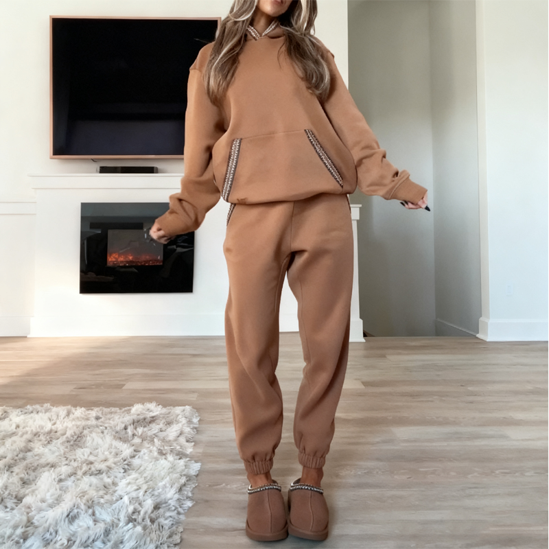 Women's casual outfit with hooded top and elastic waist pants